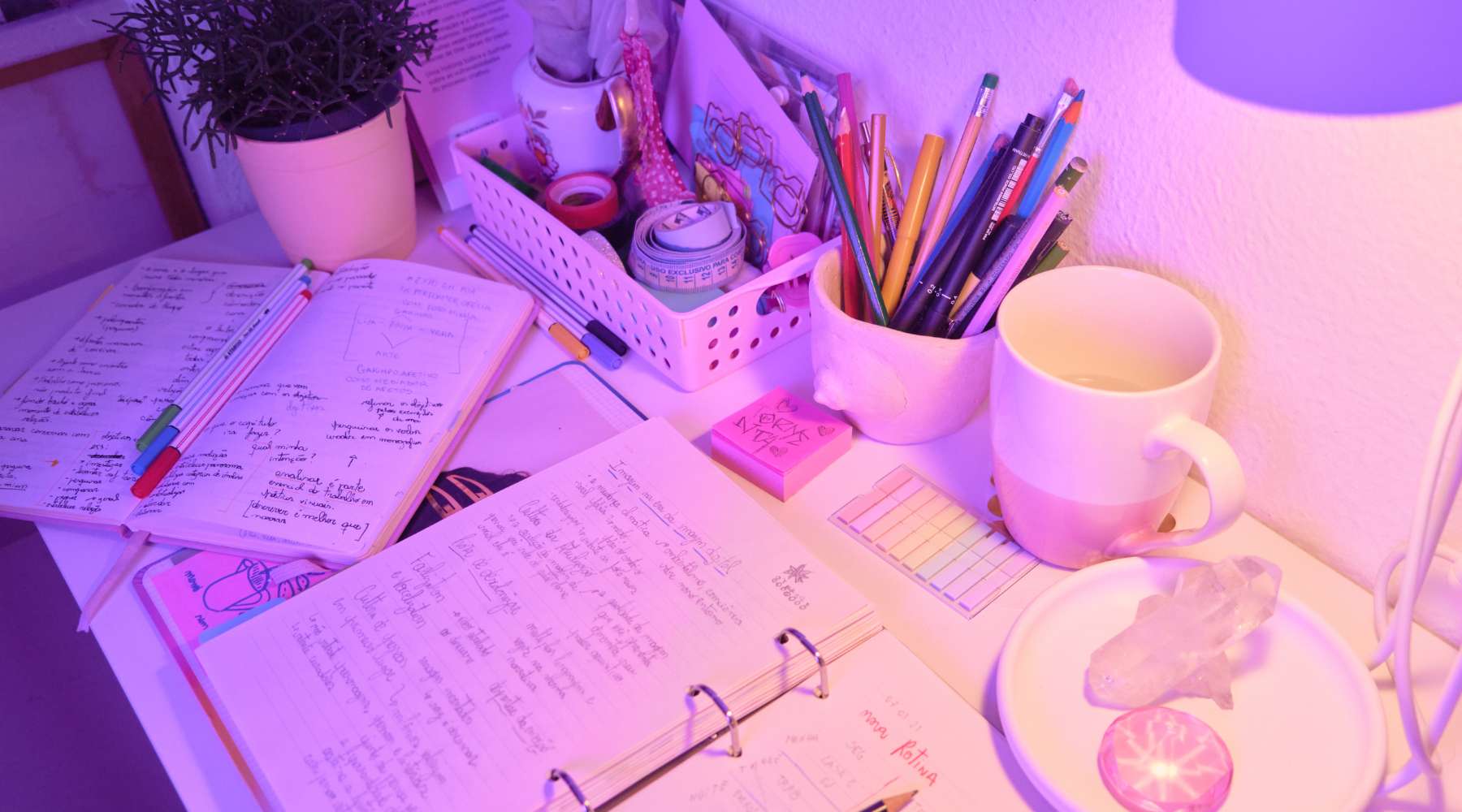 A cluttered home office desk